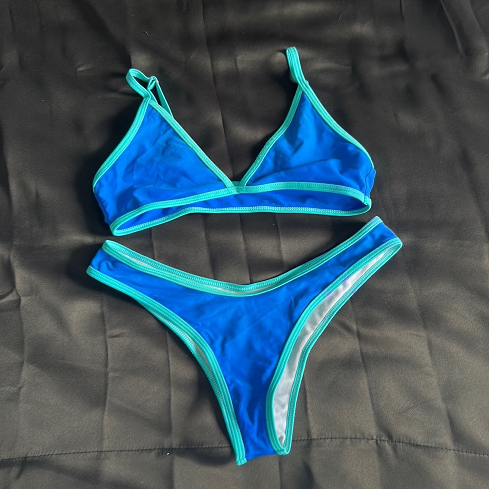 Bikini set, blue and teal, tags cut out.
